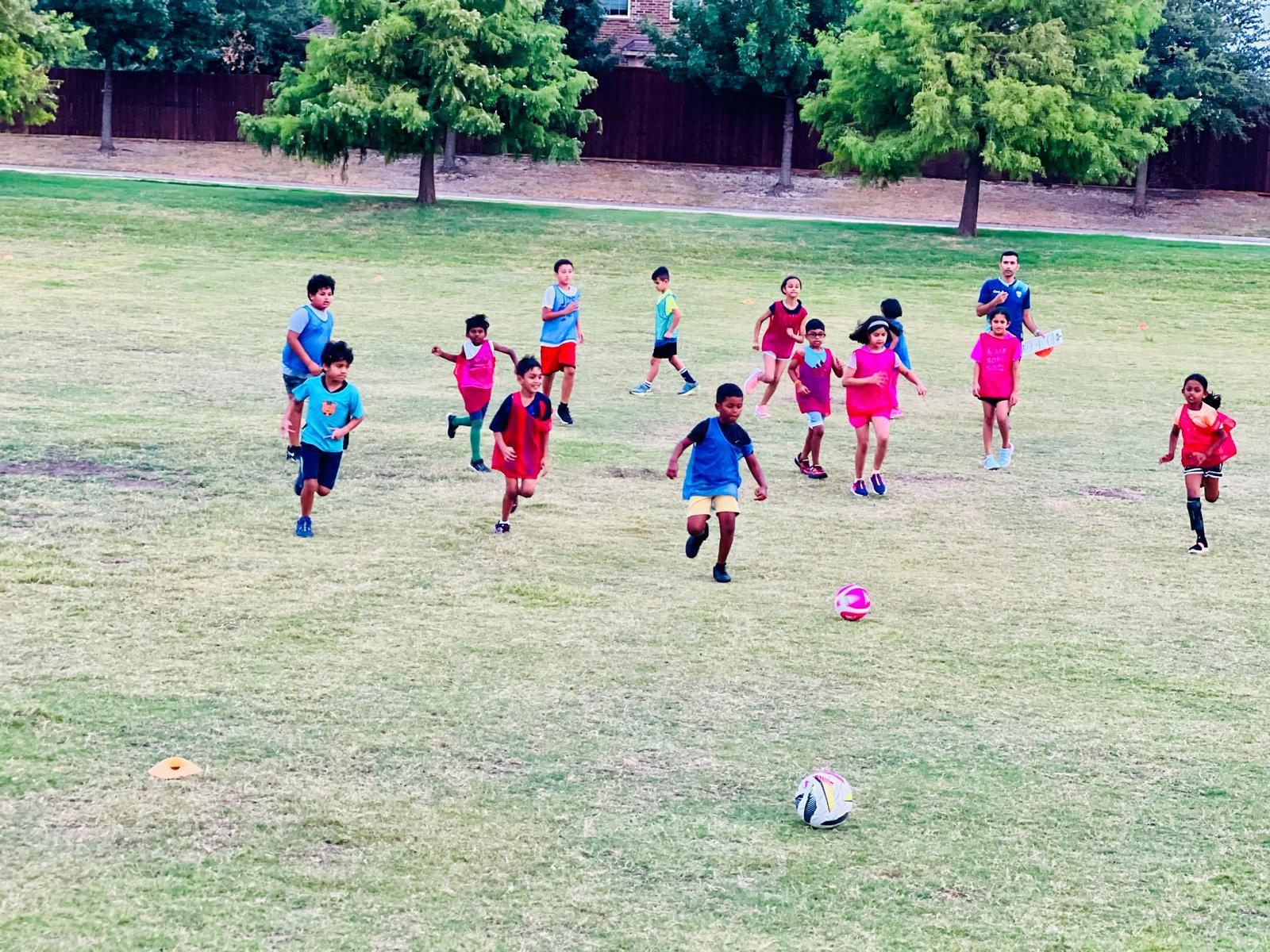 Kids in their first days of football training with LetsAimIt